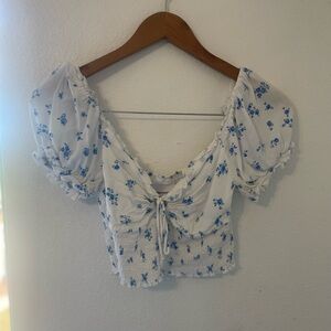 White and blue floral shirt